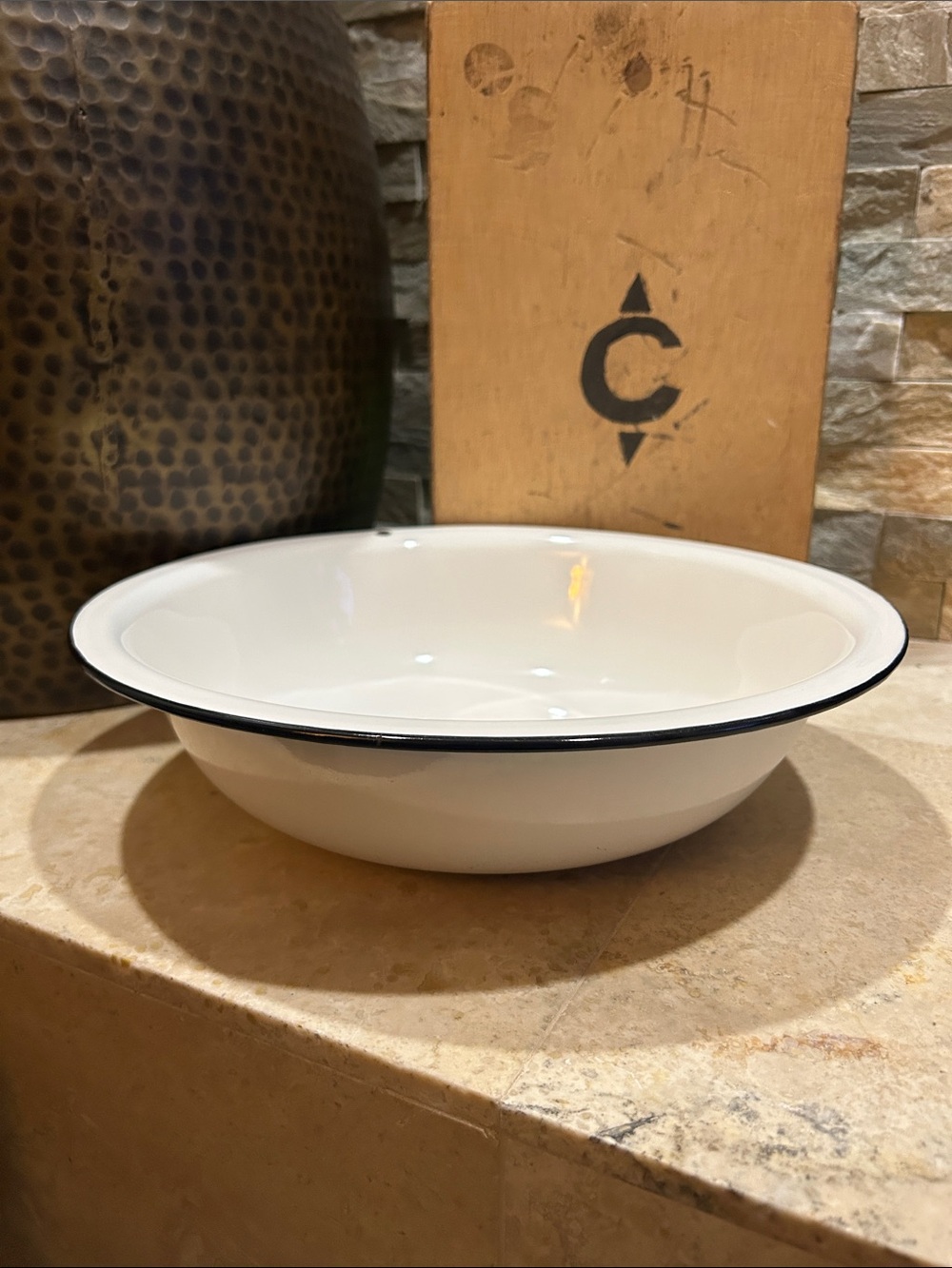 vintage white and black enamel wash basin